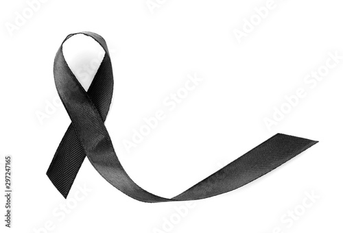 Black ribbon on white background, top view. Funeral symbol photo