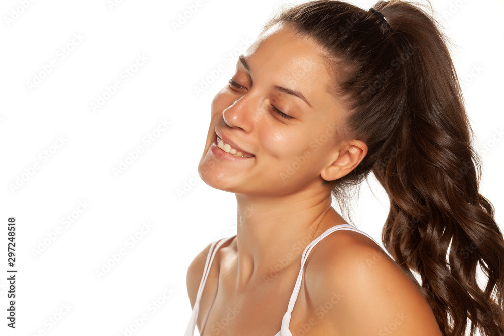 Young smiling woman without makeup on white background Young smiling woman without makeup on white background