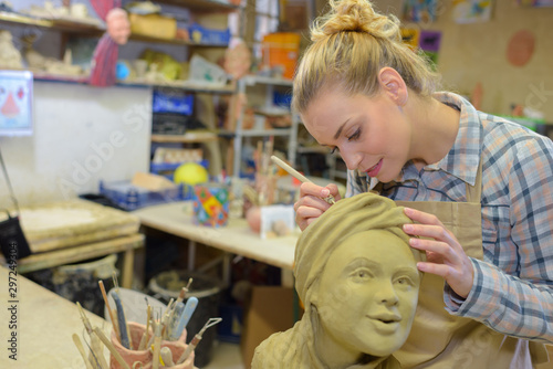 female clay sculpture at work