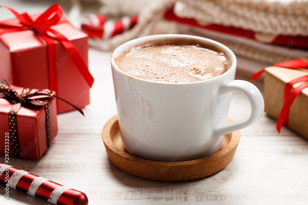 a cup of chocolate with red gift boxes a cup of chocolate with red gift boxes