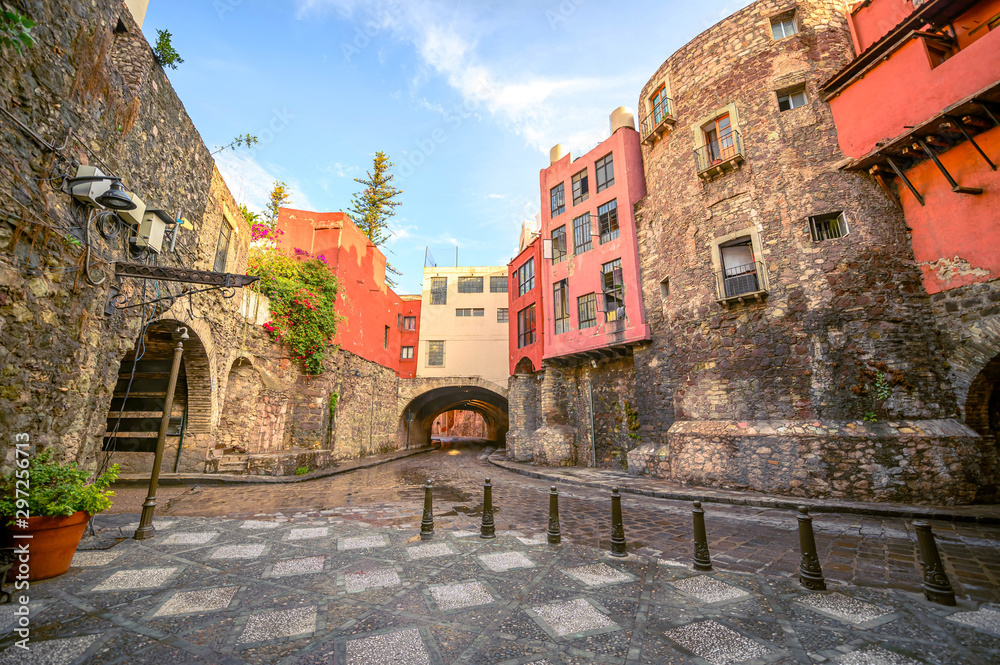 Streets of the Guanajuato historic downtown, city tunnels and colorful colonial-style houses of a Mexican town.
