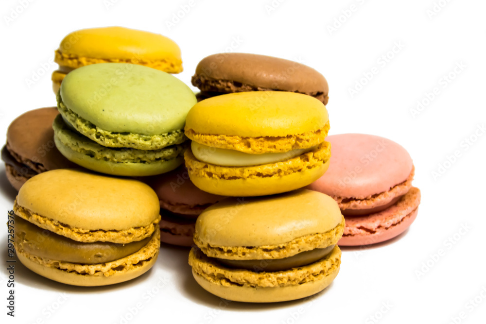 Colored macarons isolated on white background, typical French dish