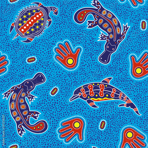 Australian aboriginal art seamless vector pattern with dolphin, turtle, platypus, palm and other dotted typical elements