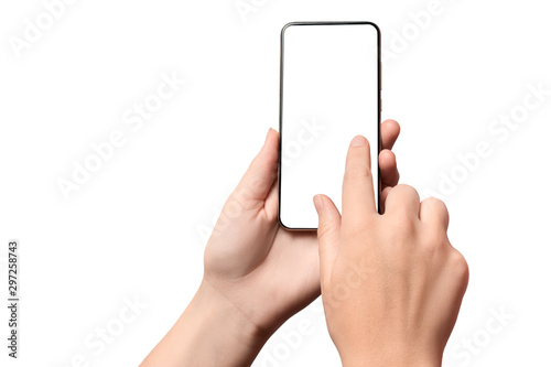 Hand girl holding a modern smartphone with a blank screen. Isolated on white background.