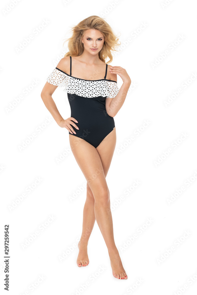 Young sexy blonde woman in swimwear, isolated on white background