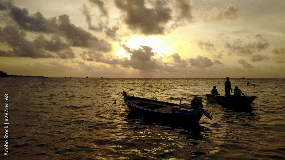 small boat under malaysia golden hour small boat under malaysia golden hour