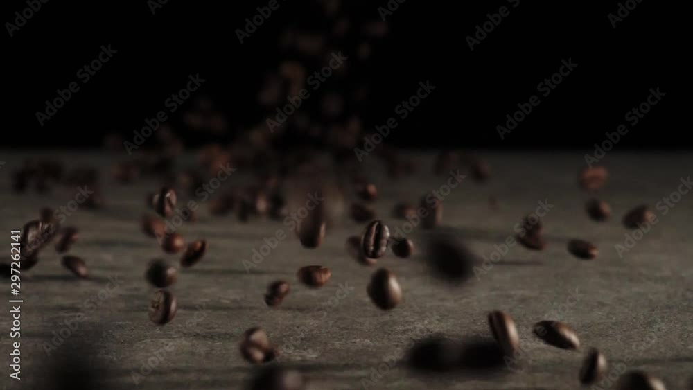 Roasted coffee beans falling down on ceramic background. Fragrant fresh ...
