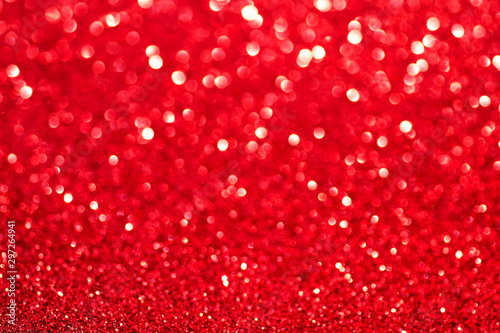 Red glitter texture background, sparkling Christmas wallpaper.