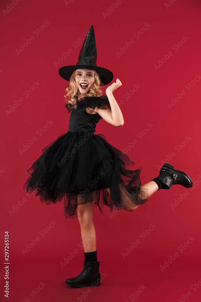 Pretty little girl witch in carnival halloween costume Pretty little girl witch in carnival halloween costume