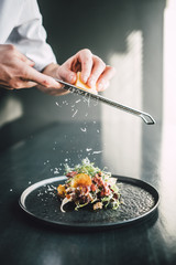 Healthy and delicious beef sandwich on dark table at restaurant, chef making food