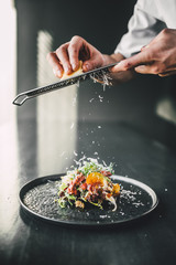 Healthy and delicious beef sandwich on dark table at restaurant, chef making food