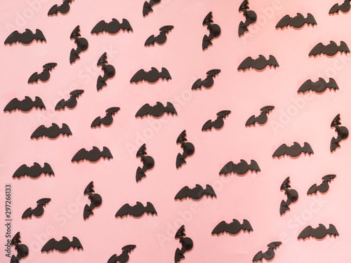 Bat pattern for halloween on pink background © alexat25