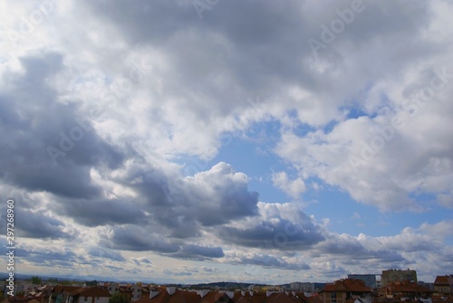 clouds on blue sky in day © Maria Brzostowska