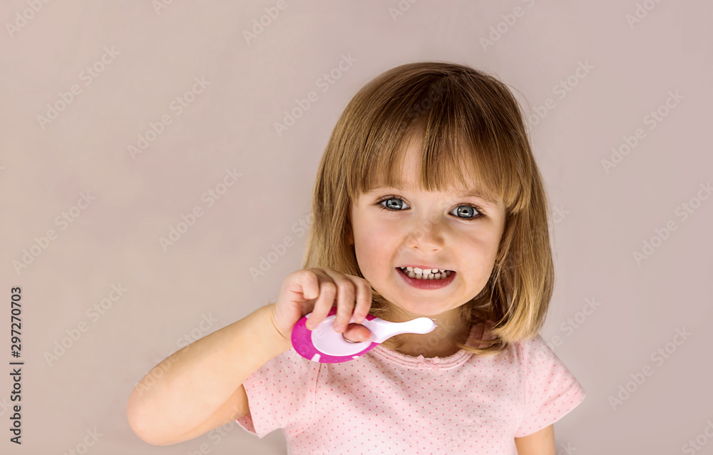 Happy child kid girl brushing teeth. Health care, dental hygiene, people and beauty concept. Mockup, free spase. Happy child kid girl brushing teeth. Health care, dental hygiene, people and beauty concept. Mockup, free spase.
