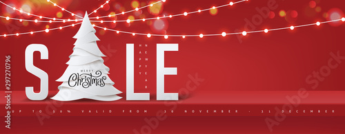 Christmas sale banner background red shelf on the wall for display and Glowing lights.Merry Christmas text Calligraphic Lettering Vector illustration.