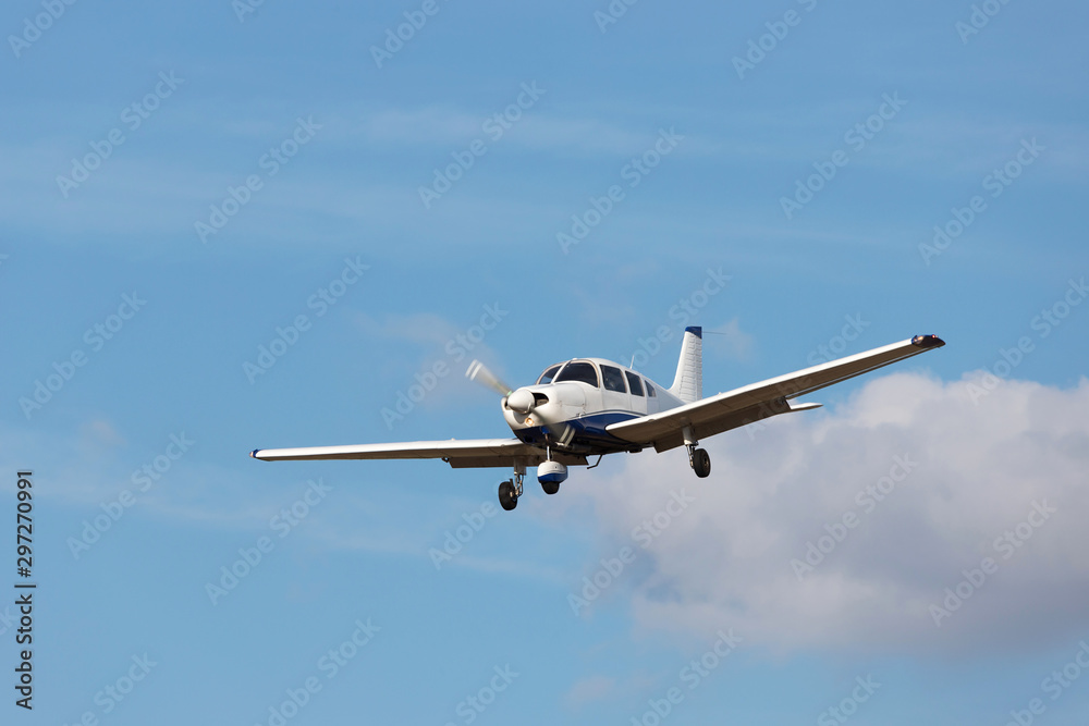 sports airplane flying mid air