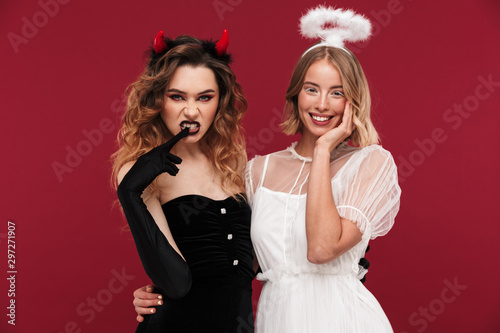 Smiling women angel and impudent demon