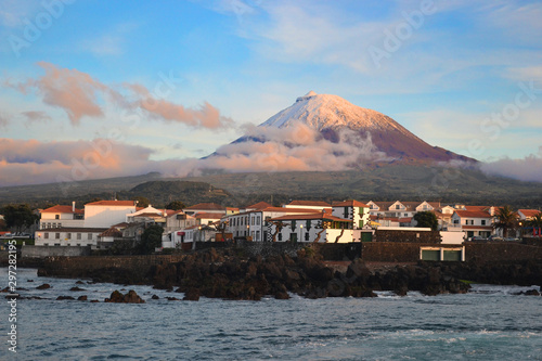 The highest mountain of Portugal, the Azores volcano Montanha do Pico on the island of Pico at sunset, village Madalena photo