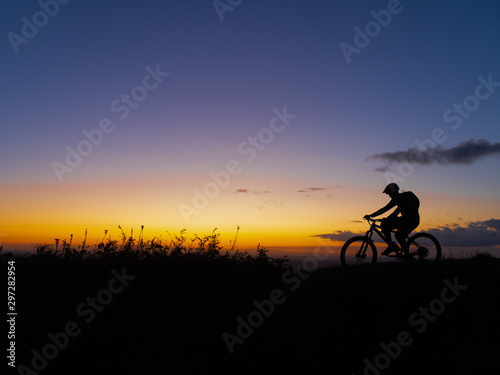 Sunset Mountain Biker Silhouette