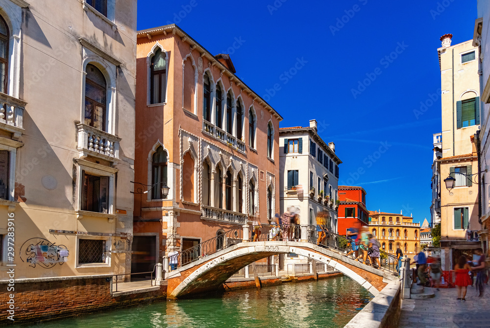 Ancient buildings and boats in the Grand canal in Venice. Italy