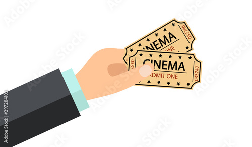 Hand holding two cinema tickets