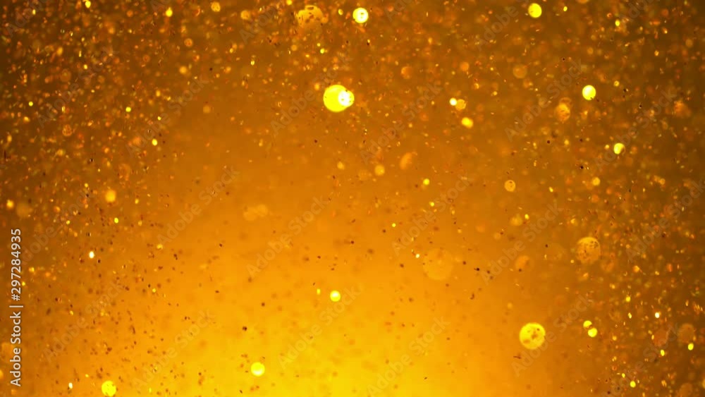 Golden Glitter Background in Super Slow Motion at 1000fps. Golden Glitter Background in Super Slow Motion at 1000fps.