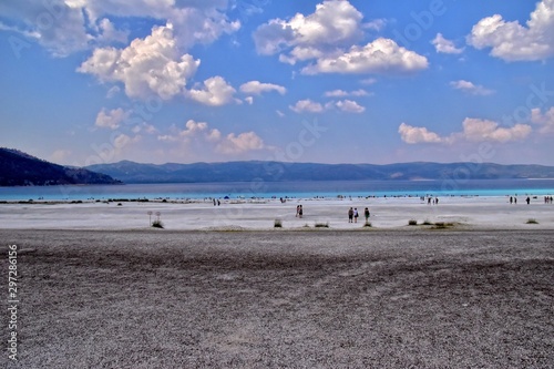 summer landscape of turkish lake Salda with turquoise water  blue sky and white beach