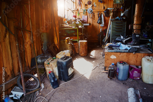 Foto Workshop, shed, garage or storage room with tools for repair, chores, spare parts from various equipment