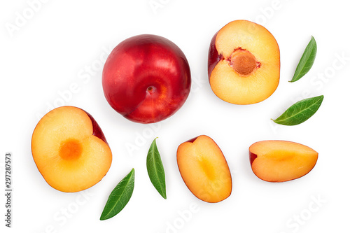 fresh red plum and half with leaves isolated on white background. Top view. Flat lay