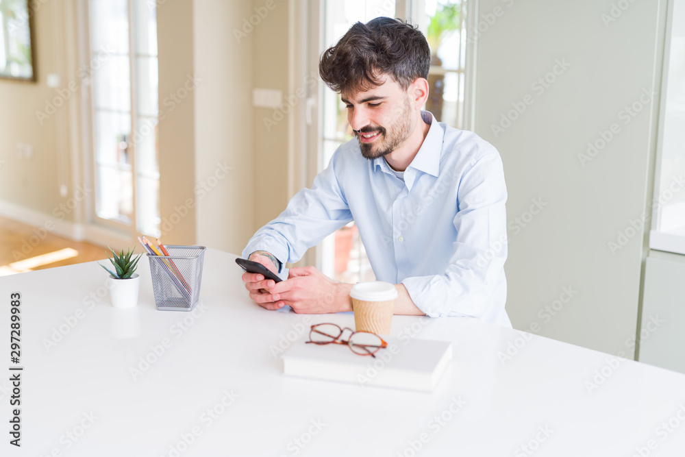 Young business man working using smartphone Young business man working using smartphone