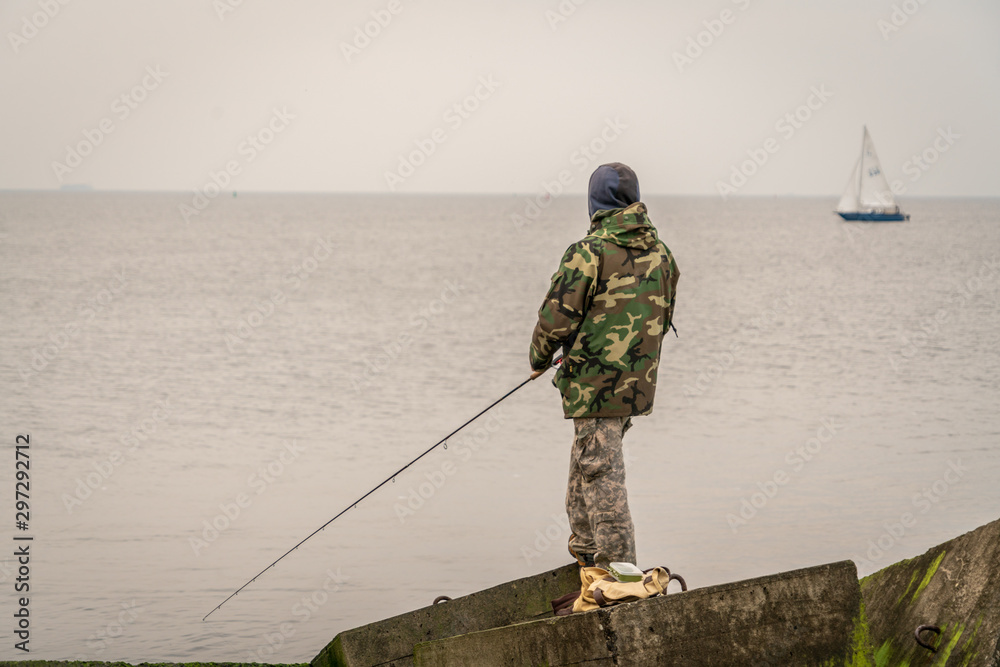 Man fishing from the pier