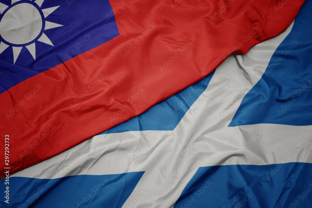 waving colorful flag of scotland and national flag of taiwan. waving colorful flag of scotland and national flag of taiwan.