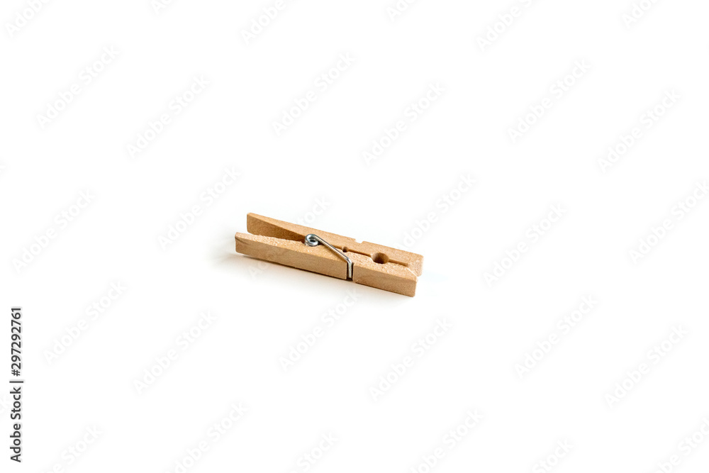 Wooden clip isolated on white background. Space for text. Wooden clip isolated on white background. Space for text.