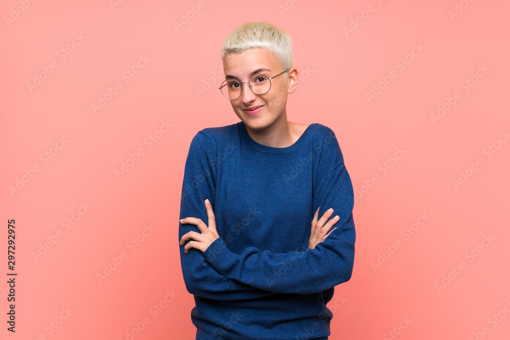 Φωτογραφία Teenager girl with white short hair over pink wall with glasses and smiling