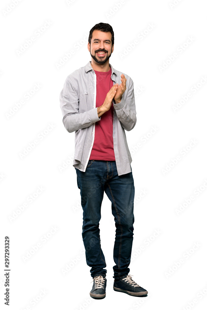 Naklejka premium Full-length shot of Handsome man with beard applauding after presentation in a conference over isolated white background