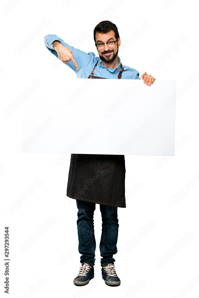Man with apron holding an empty placard Man with apron holding an empty placard