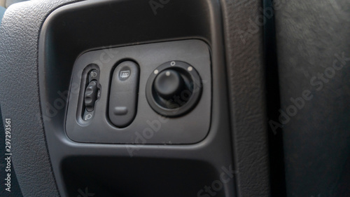 rear window heating controls in a car © GingerCat