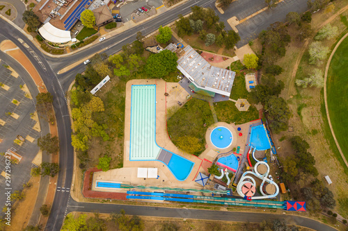 Aerial view of the suburb of Macquarie showing a waterpark and pool on a cloudy morning in Canberra, the capital of Australia       © Steve