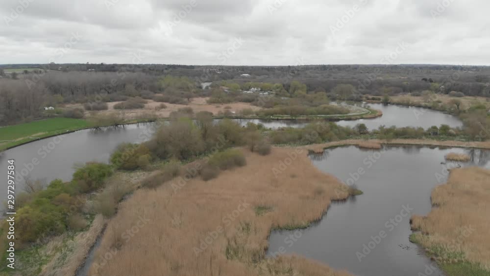 River Yare And Reed Marsh Surlingham Norfolk Broads Dull Overcast Day Aerial 4K Cine D River Yare And Reed Marsh Surlingham Norfolk Broads Dull Overcast Day Aerial 4K Cine D