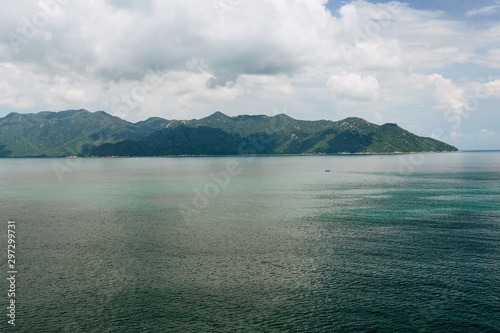 Tropical seascape with mountain view.