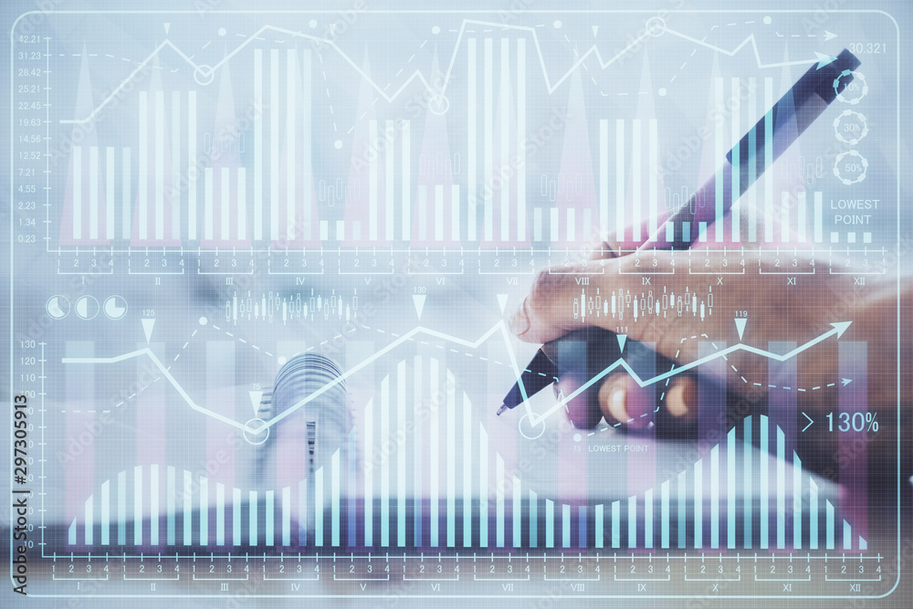 Forex graph on hand taking notes background. Concept of research. Multi exposure Forex graph on hand taking notes background. Concept of research. Multi exposure