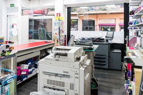 View of photocopy shop with work machines