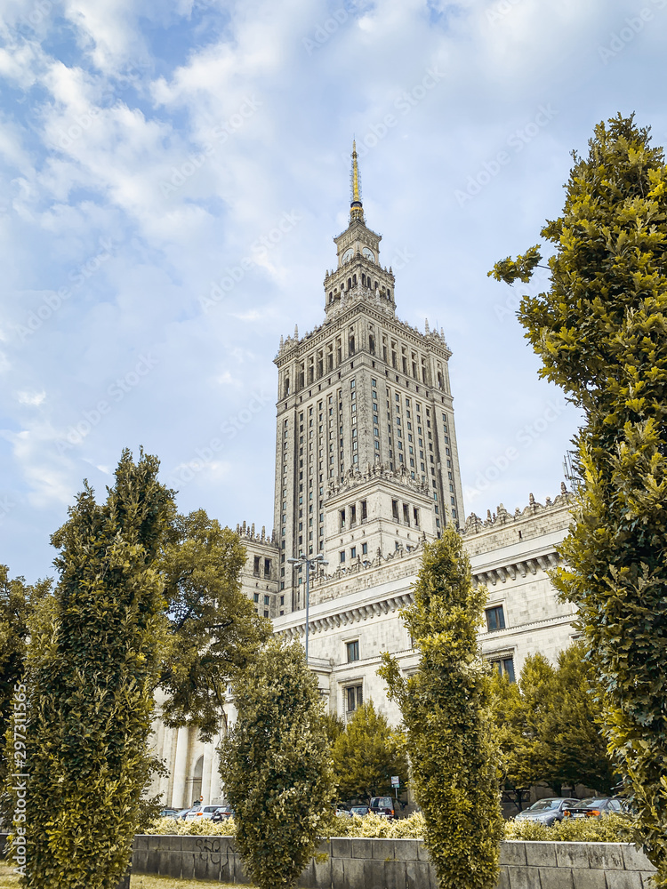 Warsaw Palace of Culture and Science in autumn. Yellow trees. City autumn landscape. Travel and tourism in Warsaw concept.
