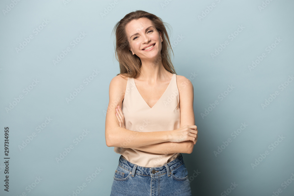 Portrait of smiling Caucasian woman posing in studio