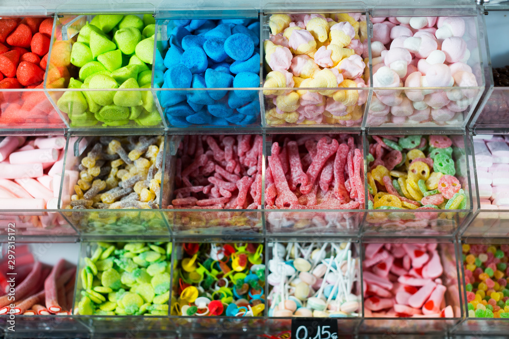 Variety of colored sweets on shelves