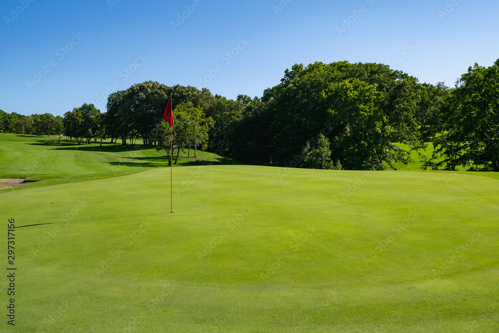 Panorama View of Golf Course with beautiful putting green. Golf course with a rich green turf beautiful scenery. Panorama View of Golf Course with beautiful putting green. Golf course with a rich green turf beautiful scenery.