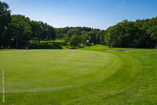Panorama View of Golf Course with beautiful putting green. Golf course with a rich green turf beautiful scenery. 