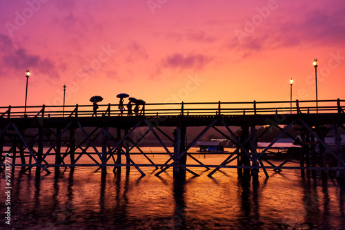 Silhouette Mon wooden bridge at dusk  Sangkhlaburi