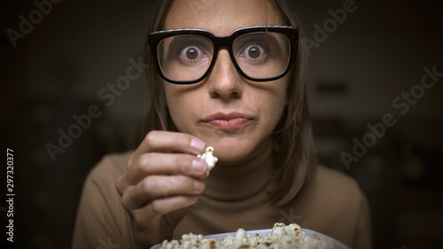 Woman with movies addiction photo