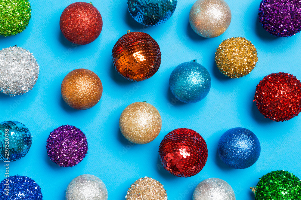 Top view of creative holiday baubles on colorful background. Christmas ornament concept Top view of creative holiday baubles on colorful background. Christmas ornament concept